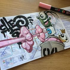 a piece of paper with cartoon characters on it next to a marker and pencils