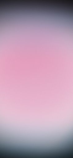 a blurry image of pink and grey colors