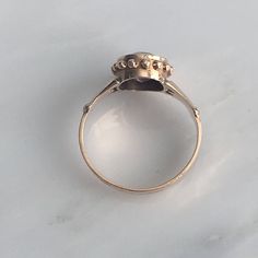 Details: Lovely Victorian Rose Gold Amethyst ring in 10k Gold. This piece is so sweet, and in remarkable condition. It is very feminine and has lovely details. There are no markings on the inside of the band. Measurements: Ring is a size US 6 and can be sized for a fee. The band itself is 2.9mm in width, and the setting including the amethyst is 11mm x 9mm (the amethyst measures 8.75mm x 6.75mm). Condition: The overall all condition of this ring is excellent. Please ask all questions prior to pl Heirloom 14k Rose Gold Jewelry With Rose Cut Diamonds, Purple Rose Cut Diamond Rings In 14k Gold, Purple 14k Gold Ring With Rose Cut Diamonds, Purple 14k Gold Rings With Rose Cut Diamonds, Amethyst Promise Ring With Rose Cut Diamonds, Round Amethyst Promise Ring With Rose Cut Diamonds, Antique 14k Rose Gold Rings, Victorian Rose Gold Ruby Ring, Heirloom 14k Stamped Amethyst Jewelry