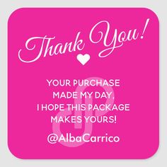 a pink square sticker with the words, thank you and a heart on it