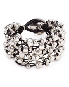 Unconventionally radiant, Uno de 50's masterful bracelet has a bubbly, weekend-right charm. Modern Silver Beaded Bracelets, Silver Jewelry With Round Beads For Fashion, Modern Polished Beads Bracelet, Unique Jewelry With Spacer Beads, Elegant Multi-strand Silver Beads Bracelet, Elegant Multi-strand Polished Beaded Bracelets, Modern Jewelry Bracelet As Fashion Accessory, Silver Bracelets With Round Beads As Fashion Accessory, Adjustable Multi-strand Modern Jewelry