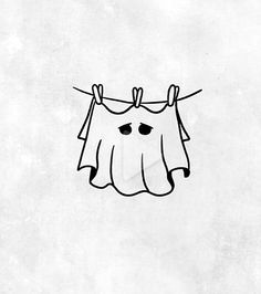 a drawing of clothes hanging on a line with eyes drawn on it's clothesline