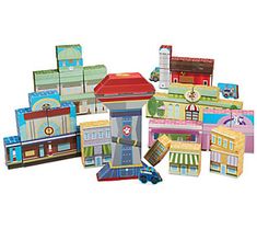 a bunch of toys that are in the shape of buildings