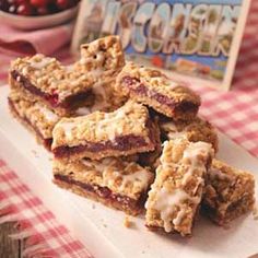 a pile of fruit bars sitting on top of a cutting board