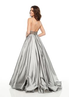 Look and feel like a princess in the luxurious Rachel Allan 7094 Gunmetal Ballgown! Crafted from crepe organza, this gorgeous gown features a flattering beaded waist, delicate spaghetti straps and pockets! Step onto the red carpet and make a statement! Prom Ball Gown With Spaghetti Straps And Fitted Bodice, Prom Ball Gown With Fitted Bodice And Spaghetti Straps, Elegant Gown With Beaded Straps For Prom Season, Elegant Gown With Beaded Straps For Prom, Spaghetti Strap Ball Gown With Fitted Bodice For Prom, Elegant Ball Gown With Spaghetti Straps, Elegant Spaghetti Strap Ball Gown For Prom, Glamorous Satin Finish Gown For Prom Season, Glamorous Satin Finish Prom Gown