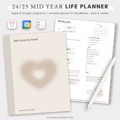 the mid - year life planner is open and ready to be used as a workbook