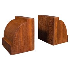 two pieces of wood sitting on top of each other