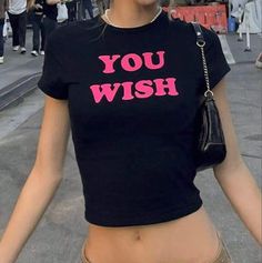 High quality "You Wish" Y2K Tee. The Devil Wears Prada? No... The Devils Wears Cute Y2K Tees 💅💅 ⭐️ 100% ring-spun cotton  ⭐️ Extremely light and comfortable fabric  ⭐️ Slim fit with longer body length ⭐️ Runs true to size, order one size larger for a more relaxed fit --IMPORTANT-- ⭐️ PLEASE CONTACT ME IF THERE IS AN ISSUE WITH YOUR ORDER BEFORE LEAVING A NEGATIVE REVIEW. We strive for 100% customer satisfaction, so please to not hesitate to reach out! ⭐️ We do NOT accept cancellations, returns or exchanges since all items are made to order. Please ensure that sizing/color/shipping address are all correct before placing an order. Big Shirts, Crop Top Styles, Round Neck Crop Top, Fashion 2000s, Striped Knitted Sweater, Baby Tees Y2k, Y2k Baby Tee, Pink Letter, Y2k Clothes