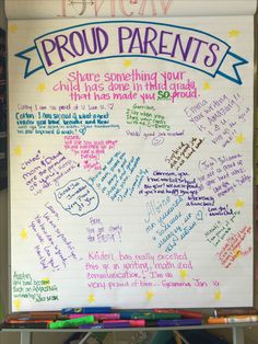 a white board with writing on it that says proud parents