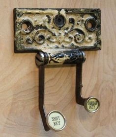 an old fashioned door handle with two knobs on it