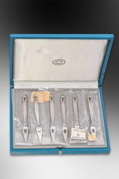 Enhance your next gathering with this beautiful set of Georg Jensen Sterling Acorn Cocktail Picks. The set of six comes in its original box, making it an ideal gift for cocktail enthusiasts or collectors. A true vintage find with timeless style! #VintageStyle #CocktailParty #SterlingSilver