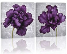 two purple flowers are shown in this artistic photo