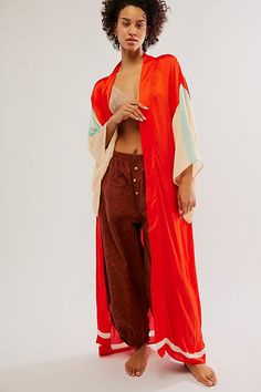 Featuring a colorful and statement design on the back, this maxi kimono is featuring in a silky fabric and shapeless silhouette. * Wide sleeves * Maxi length * Arm vents | Moon Dance Maxi Kimono by Free People in Red Moon Dance, Maxi Kimono, Silky Fabric, Wide Sleeves, Boho Clothing, Boho Outfits, Color Coding, Free People, Sleeve Length