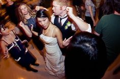 a bride and groom dancing on the dance floor