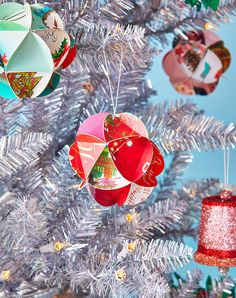 christmas ornaments hanging from the top of a tree