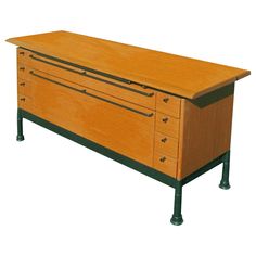 an old fashioned wooden dresser with two drawers on one side and black metal handles on the other