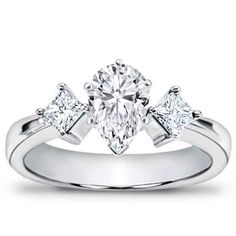 an engagement ring with three stones in the center