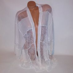 Victoria Secret Lingerie Robe Kimono Cover Up M/L Medium Large White Allover Lace New With Tags *Bundle To Save Chavonne11 020923 This Victoria Secret Lingerie Robe Is A Stunning Kimono Style Cover Up, Perfect For Lounging Or Wearing As A Luxurious Layer Over Lingerie. The M/L Size Is Designed To Fit Medium To Large Sizes. The Robe Is Made With Allover Lace In A Crisp White Color, Adding A Touch Of Sophistication And Elegance. The Kimono Style Provides A Comfortable And Relaxed Fit, Making It A White Feminine Sleepwear For Relaxation, White Lace Trim Sleepwear For Relaxation, Delicate Lace Sleepwear For Beach, Feminine Delicate Lace Sleepwear For Beach, White Lace Long Sleeve Sleepwear, White Sheer Loungewear, White Sheer Sleepwear For Loungewear, White Open Front Sleepwear For Wedding Night, Elegant White Stretch Sleepwear