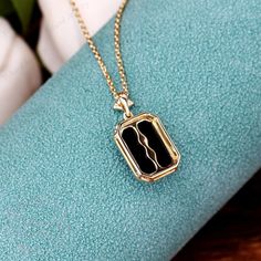 "❤Jewelry Details -Gold Type : 14k two tone gold Center Stone: Natural Black Onyx 8*11mm, Approximately 2.8ct Cut: Emerald Cut / 3EX Stone Type: Diamond,0.03ctw Color: G-H Clarity: SI1 Cut: Round Cut / 3EX -Pendant Width: 10mm -Pendant Height: 18.2mm -Chain Length: 40+2+3cm -Or Without Chain SKU: YP0028 ❤The link for the same style ring is https://www.etsy.com/listing/933531377/emerald-cut-natural-black-onyx-ring?ref=shop_home_active_1&frs=1 ❤The link for the same style earrings is https://w Black 14k Gold Engraved Jewelry, Engraved 14k Black Gold Jewelry, Engraved Black 14k Gold Jewelry, Elegant Stamped 14k Rectangular Pendant Jewelry, Black Engraved Necklaces For Anniversary, Formal Black Engraved Necklace, Engraved Black Necklaces For Anniversary, Gold Pendant With Black Enamel, Black 14k Gold Pendant Jewelry