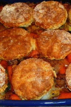 a casserole dish filled with meat and vegetables