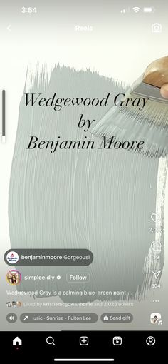 a person is using a brush to paint the wall with white paint and text that reads, wedgewod gray by bennann moore