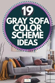 a gray sofa with pillows on it and the words, grey sofa color scheme ideas