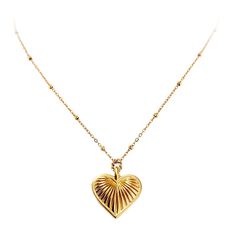 Fall in love with this glamorous gold striped heart necklace, inspired by the iconic piece worn by Barbie in the 2023 movie. It will take center stage with its feminine flair and delicate detailing. Add a touch of edgy glamour with this unique and timeless piece. Available in gold Crafted from 18K PVD Gold Stainless Steel Chain length 18" with a 2" extender Water and Tarnish Resistant Charm Measures: 19mm x 19mm Burr Basket, Birthday 2023, Cute Ear Piercings, Dope Jewelry, Jewelry Lookbook, Classy Nails, Gold Stripes, Jewelry Cleaner, Center Stage