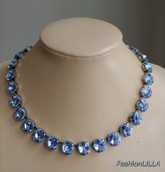 Swarovski crystal light sapphire necklace,baby blue rivoli necklace,blue jewelry,sapphire jewelry,strass necklace,crystal wedding necklace This choker is made with  12mm rivoli cut Swarovski chaton crystals and they are complimented beautifully with the cool tone of the antique silver setting.  Setting is Heavy cast German Brass in antique silver color. It is thick and strong and is manufactured according to EU and US standards; nickel, cadmium and lead free.  Total length of stones is 16 inches Crystal Wedding Necklace, Jewelry Sapphire, Blue Choker, Diamond Cluster Earrings, Light Sapphire, Swarovski Crystal Necklace, Anna Wintour, Crystal Light, Necklace Crystal