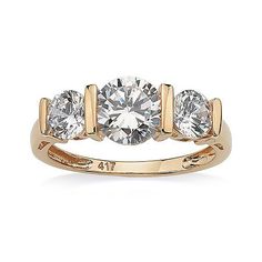 three stone diamond ring in yellow gold