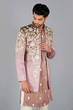 Chickoo italian cotton front-open jacket with floral and thread embroidery. Comes with aligadi pant and a kurta. - Aza Fashions Spring Floral Embroidered Sherwani With Traditional Drape, Spring Floral Embroidery Sherwani With Traditional Drape, Spring Bandhgala With Floral Embroidery, Spring Floral Embroidery Bandhgala, Wedding Cotton Sherwani With Floral Embroidery, Designer Embroidered Sherwani For Spring, Spring Sherwani With Intricate Embroidery And Traditional Drape, Spring Embroidered Bandhgala With Traditional Drape, Spring Embroidered Traditional Bandhgala