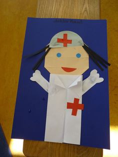 the paper doll is made to look like a nurse