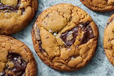 chocolate chip cookies are arranged on top of each other