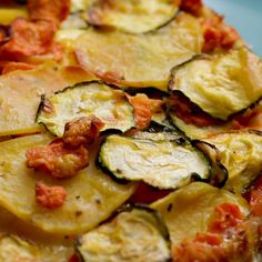 zucchini and tomato slices on top of each other