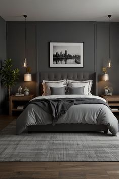 a bedroom with grey walls and wooden floors, gray bedding, two nightstands, an art print on the wall