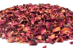 dried rose petals on a white background