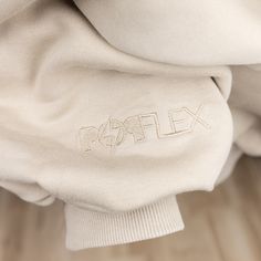 Wrap yourself in comfort and style with our Seashell Zip Cloud Hoodie. The cream color, drop shoulder design, blousy sleeves, and oversized hood create a cozy and trendy look. Stay warm and fashionable all day long! - Brand: POPFLEX - 88% Cotton/12% Poly - Machine Wash Cold/Tumble Dry Low Model - Height: 5'4 - Wearing a size XXS/XS Cozy Beige Sweatshirt With Ribbed Cuffs, Cozy Cream Sweater For Streetwear, Oversized Cream Sweater For Streetwear, Trendy Beige Hoodie With Ribbed Cuffs, Trendy Cream Sweater For Streetwear, Oversized Beige Fleece Sweatshirt, Oversized Beige Hoodie With Ribbed Cuffs, Beige Sporty Sweater For Streetwear, Oversized Cream Fleece Sweatshirt