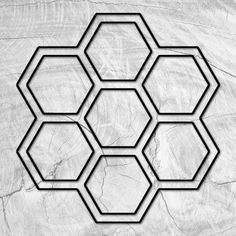 hexagons are arranged on a marble surface