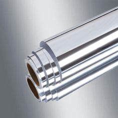 an image of a metal tube on a metallic background