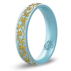 a blue ring with gold filigrees on it