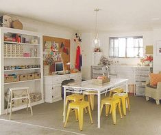 a living room filled with furniture and lots of clutter