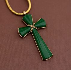 Vintage Celtic Green Chained Cross Necklace by Avon Description Brand: Avon Length: 19 inch Size: Please look at the last image Avon Cross Necklace, Celtic Green, Pendant Necklaces, Cross Necklace, Jewelry Necklace Pendant, Look At, Etsy Accessories, Jewelry Necklaces, Accessory Gift