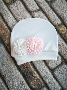 This item is available in primary color: pink, secondary color: beige. We designed and made beanie baby hats from newborn soft cotton fabric for new mom and babies maybe baby shower gift.    #babyheadband #babybeanie #newbornbabybeanie #infantbeanie  #newbornbabyhat #babyshowergift #babytiara #babygirlwrap #newmomgift  #newmomtiara #birthgiftformom #babyshowergift #newbabygift Cute White Baptism Hat, Adjustable Soft White Bonnet, Soft Adjustable White Bonnet, White Beanie Bonnet, One Size Fits Most, Adjustable Soft White Beanie, Adjustable Soft Hat For Gifts, Adjustable Soft Hat As A Gift, Soft Adjustable Hat As A Gift, White Cotton Bonnet For Baptism