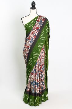 Introducing our stunning Modal Silk Kalamkari Ajrakh Saree with Green Bandhani Border in Off White - a true masterpiece that combines traditional Indian craftsmanship with contemporary elegance. This exquisite saree features intricate Kalamkari and Ajrakh prints in vibrant colors, creating a visually striking design that is sure to turn heads. The green Bandhani border adds a pop of color and traditional charm to this off-white saree, making it perfect for any special occasion or cultural event. Made with high-quality fabric, this saree drapes beautifully and exudes an air of sophistication and grace. Add this timeless piece to your collection and elevate your wardrobe with an authentic Indian touch. Color : Off White and Green. Blouse Piece : Yes. Fall Pico : Yes.  Care: Dry-Clean Only. Bandhani Border, Saree Drapes, Off White Saree, Kalamkari Designs, Ajrakh Prints, White Saree, Authentic Indian, Cultural Events, White Hand