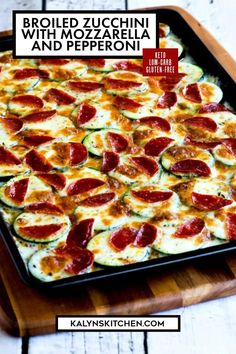 broccoli zucchini with mozzarella and pepperoni in a baking pan