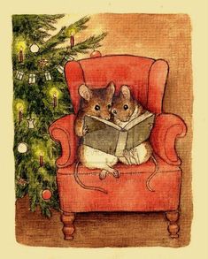 a cat sitting in a red chair reading a book next to a christmas tree with lights on it