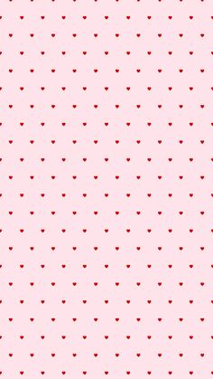 a pink background with small red hearts on the top and bottom half of the image