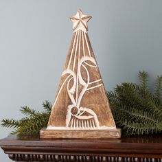 "Add a touch of holiday cheer to your home with this exquisite set of Nativity Tree Forms from Michaels. com! The beautiful wooden finish is crafted with MDF wood and carved with a modern nativity scene design, adding a religious touch to any room. Enjoy a classic holiday-inspired decor piece and bring the spirit of Christmas alive in your home! Add a touch of holiday cheer to your home with this exquisite set of Nativity Tree Forms! The beautiful wooden finish is crafted with MDF wood and carve Scroll Saw Christmas Projects, Modern Nativity, Nativity Tree, Dremel Carving, Bazaar Ideas, Star Of Bethlehem, Christmas Nativity Scene, Christmas Wood Crafts, Holiday Store