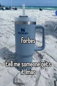 a cup that is sitting in the sand with text saying forgets forbes tell me someone gets it imo