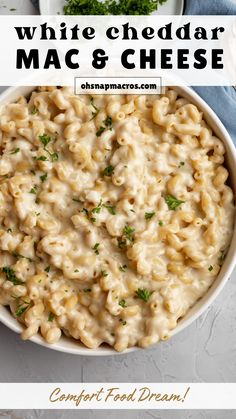 white cheddar mac and cheese in a bowl with parsley on the side