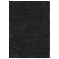 a black rug on a white background